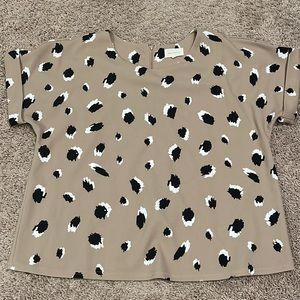 Tan, black and white work top perfect for dressing up or down!